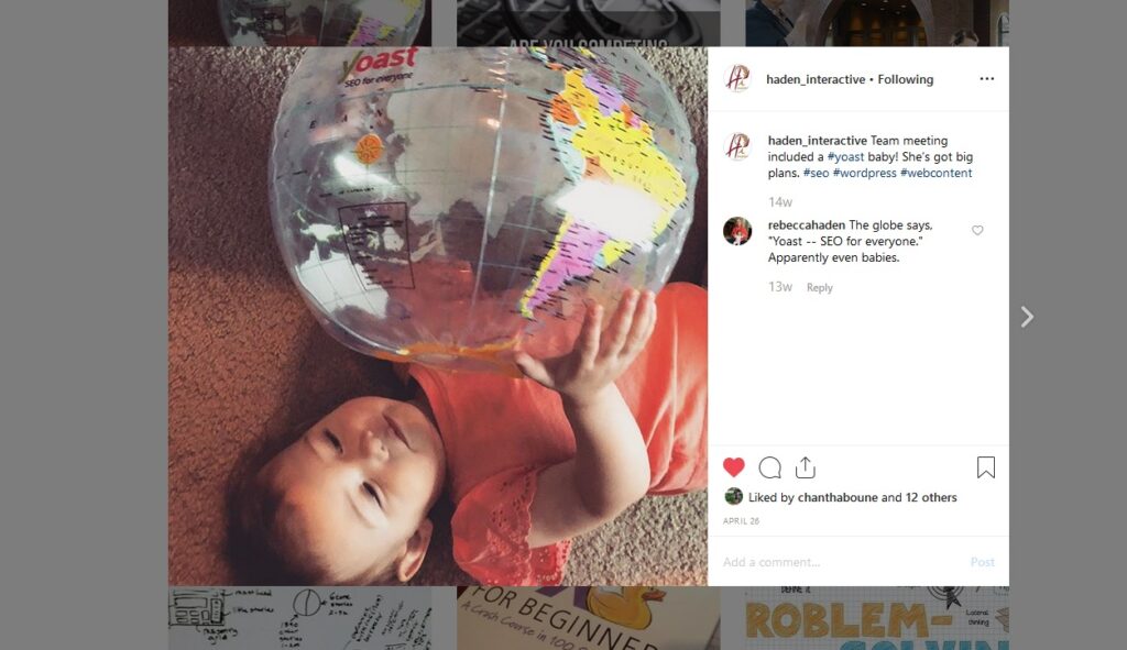 baby holding Yoast globe